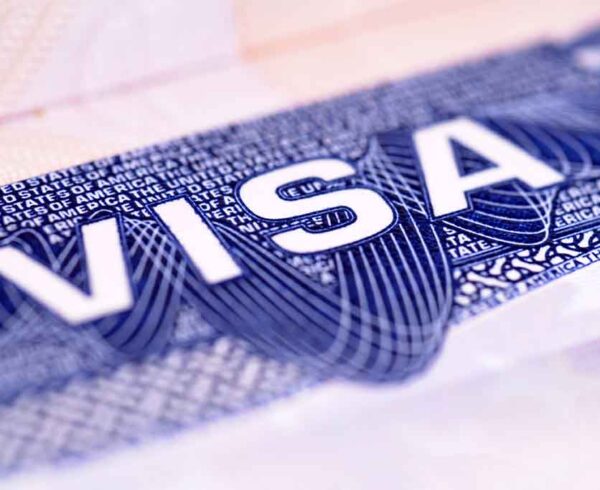 Closeup detail of a US visa document. Closeup detail of a US visa document.